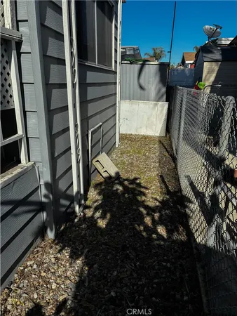 a view of balcony with wooden floor