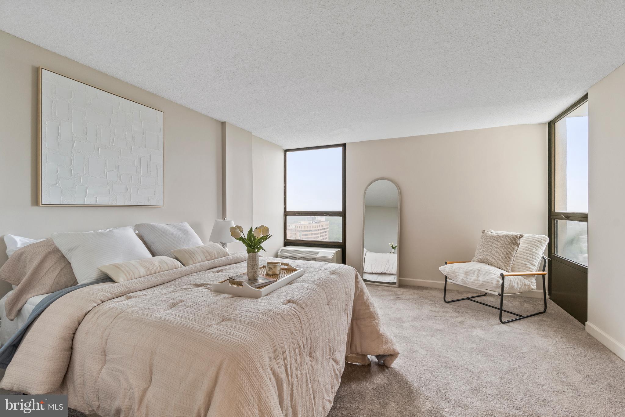205 East Joppa Road, Unit 2703 Towson, MD 21286 - Photo 29 of 34 a bedroom with furniture and a window
