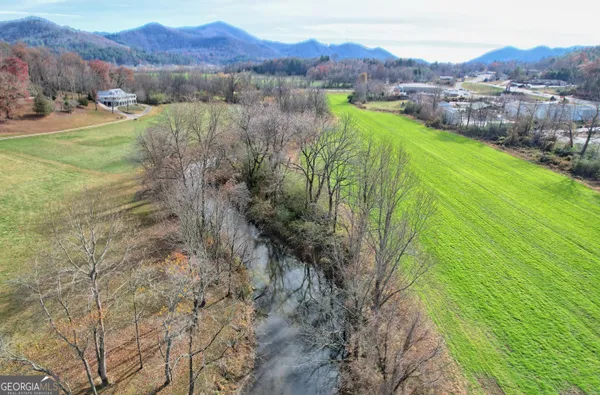 a view of lake with mountain