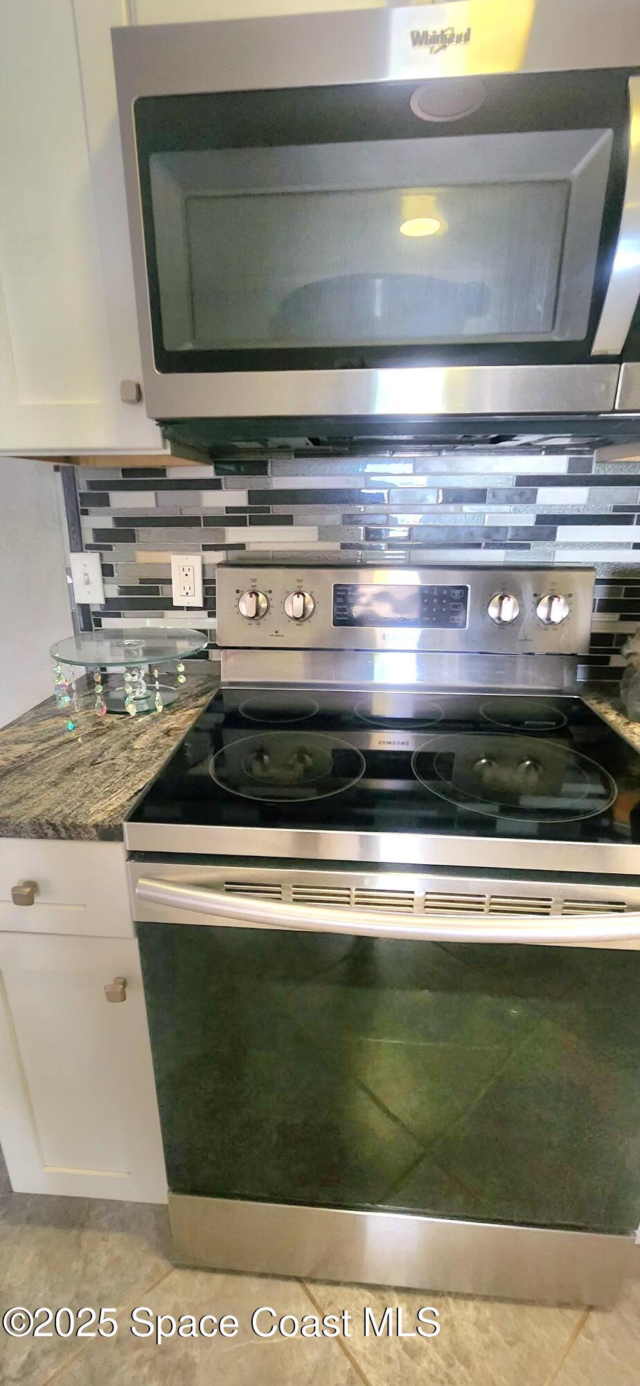 2014 Manor Drive Northeast Palm Bay, FL 32905 - Photo 12 of 24 a view of stove top oven