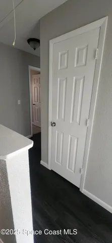 a view of a kitchen from door