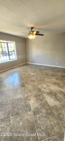 en empty room with windows