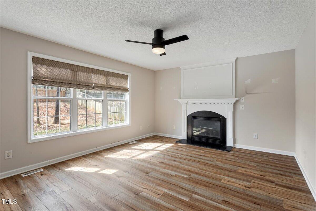 2121 Ramsgate Street Raleigh, NC 27603 - Photo 9 of 30 Spacious Living Room with Fireplace