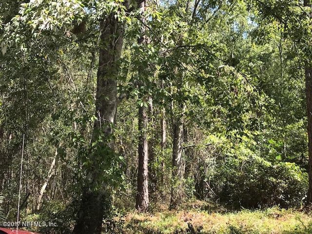 0 Loest Road Jacksonville, FL 32234 - Photo 5 of 7 a view of a yard covered in snow
