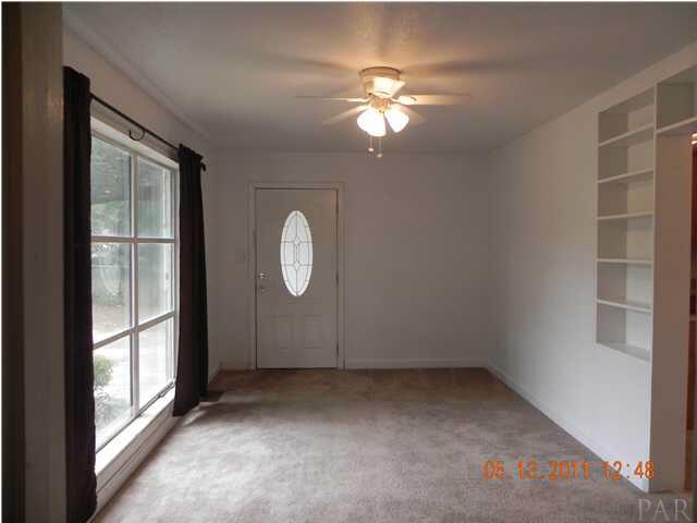 204 Alton Road Pensacola, FL 32507 - Photo 4 of 21 Another view of this spacious living room and the Eat In Kitchen to your right.