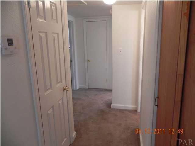 204 Alton Road Pensacola, FL 32507 - Photo 8 of 21 Walkway from the Living Room towards the Bedrooms.