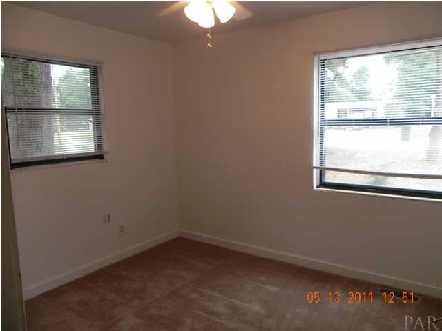 204 Alton Road Pensacola, FL 32507 - Photo 10 of 21 One of the additional Bedrooms with Lighted Ceiling Fans and Closet to your left.