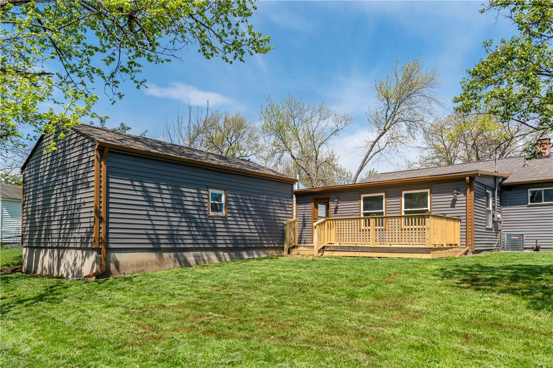 5240 Haverfield Road Dayton, OH 45432 - Photo 50 of 58 This residence features a spacious yard and a charming deck, ideal for outdoor gatherings.
