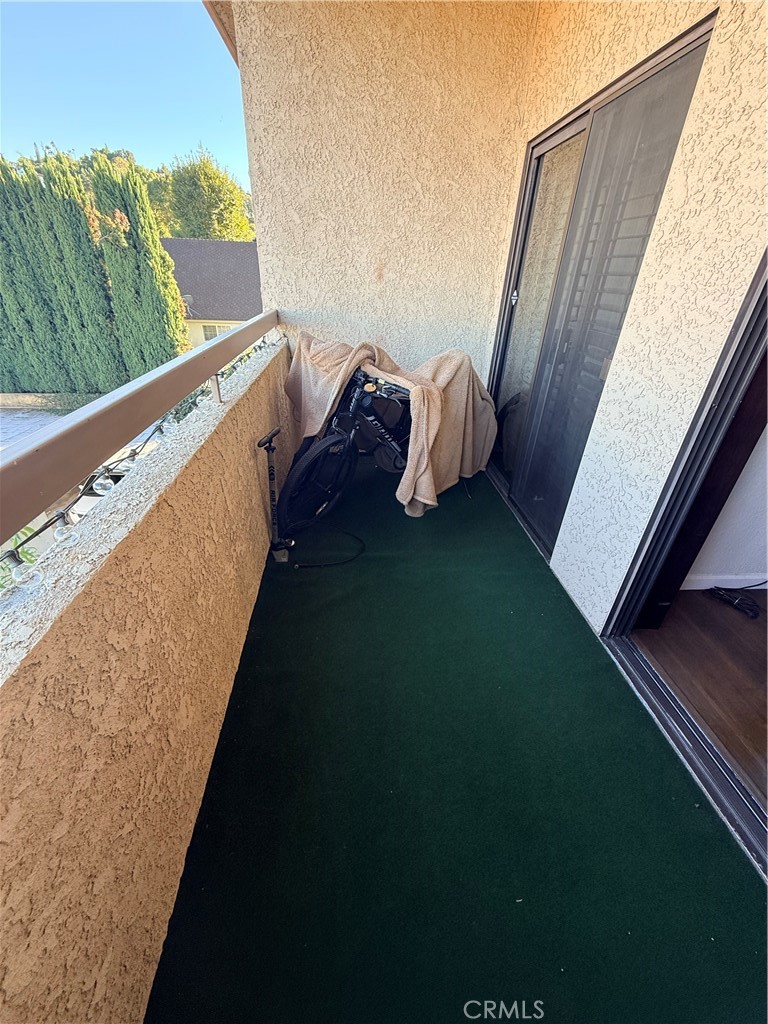 14630 Dickens Street, Unit 307 Sherman Oaks, CA 91403 - Photo 25 of 41 a view of balcony with couch