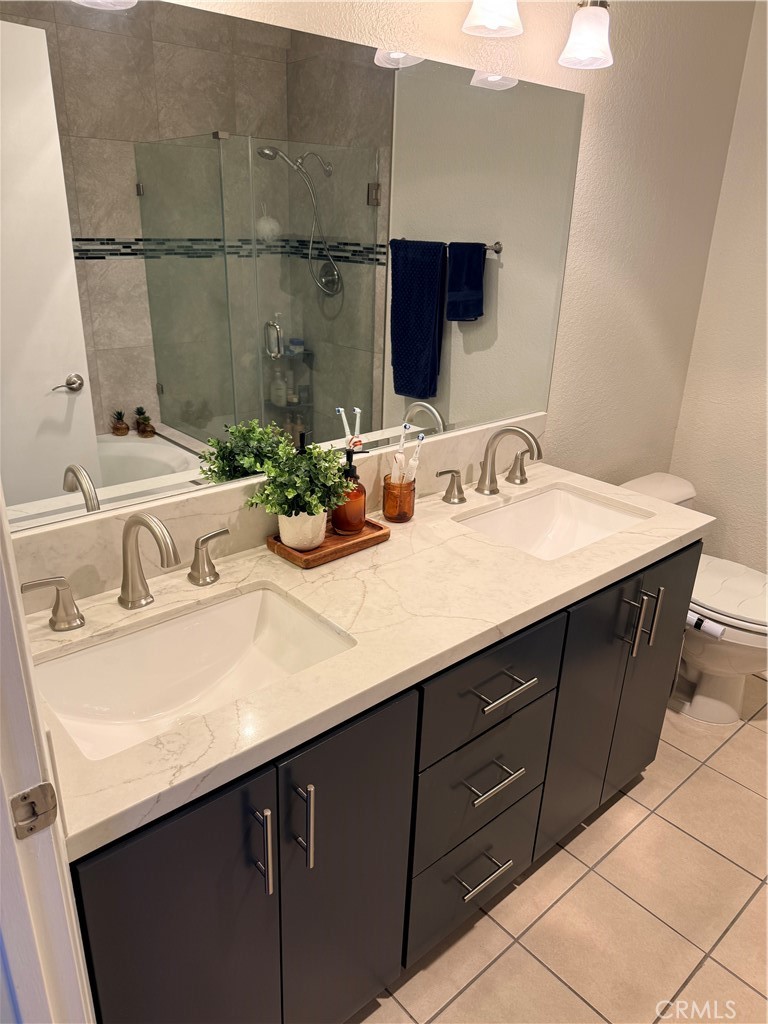 14630 Dickens Street, Unit 307 Sherman Oaks, CA 91403 - Photo 32 of 41 a bathroom with a sink and a mirror