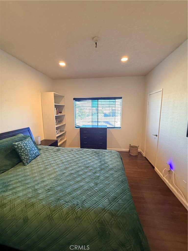14630 Dickens Street, Unit 307 Sherman Oaks, CA 91403 - Photo 41 of 41 a bedroom with a large bed and a window