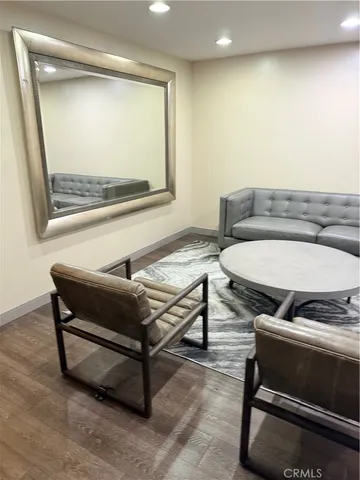 swimming pool with outdoor seating and yard