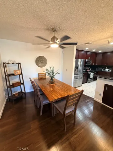 a kitchen with a sink cabinets and appliances