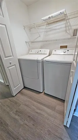 a utility room with dryer and washer