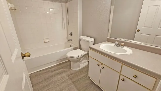 a bathroom with a sink toilet a shower and bathtub
