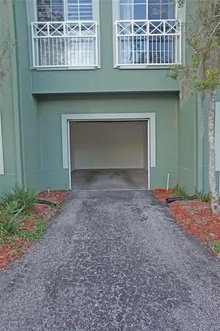 a living room with fireplace furniture and wooden floor