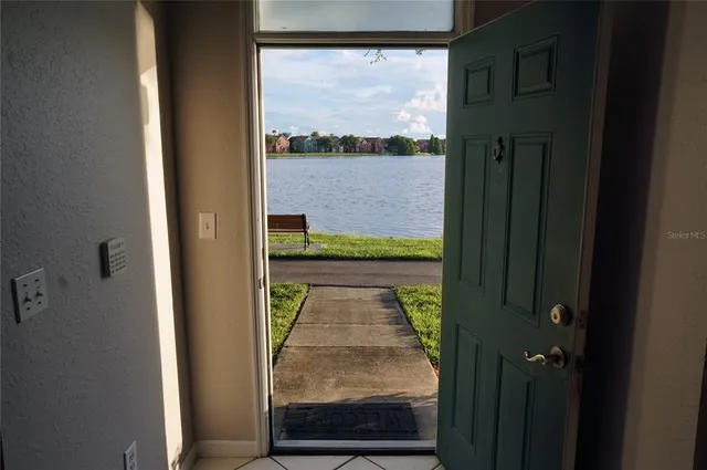 a view of swimming pool from a window
