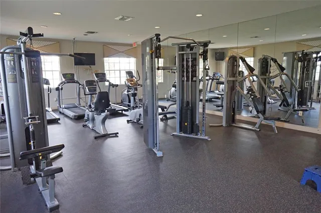 a view of a swimming pool with a lounge chairs