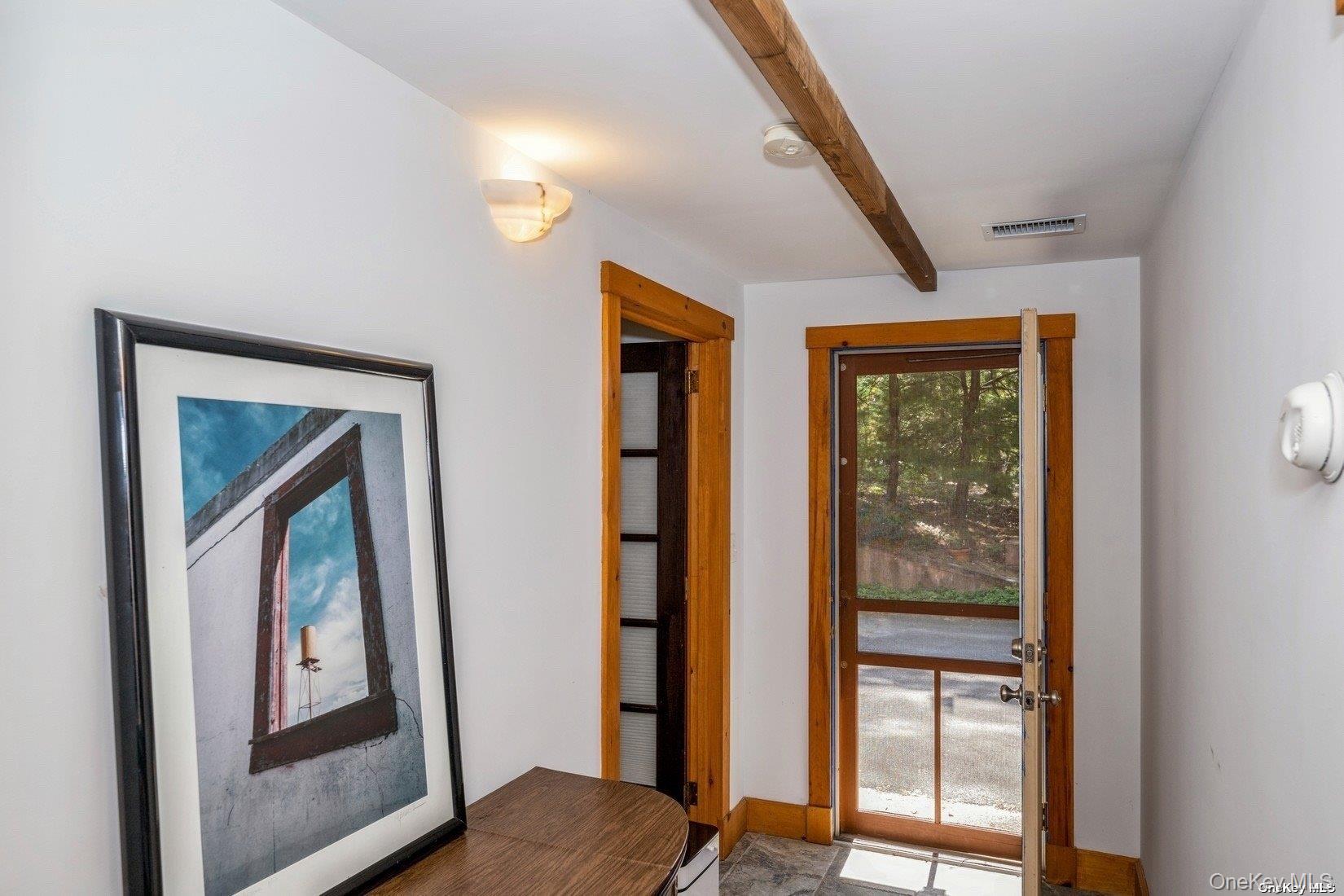 292 Little Fresh Pond Road Southampton, NY 11968 - Photo 29 of 46 a view of front door and bedroom