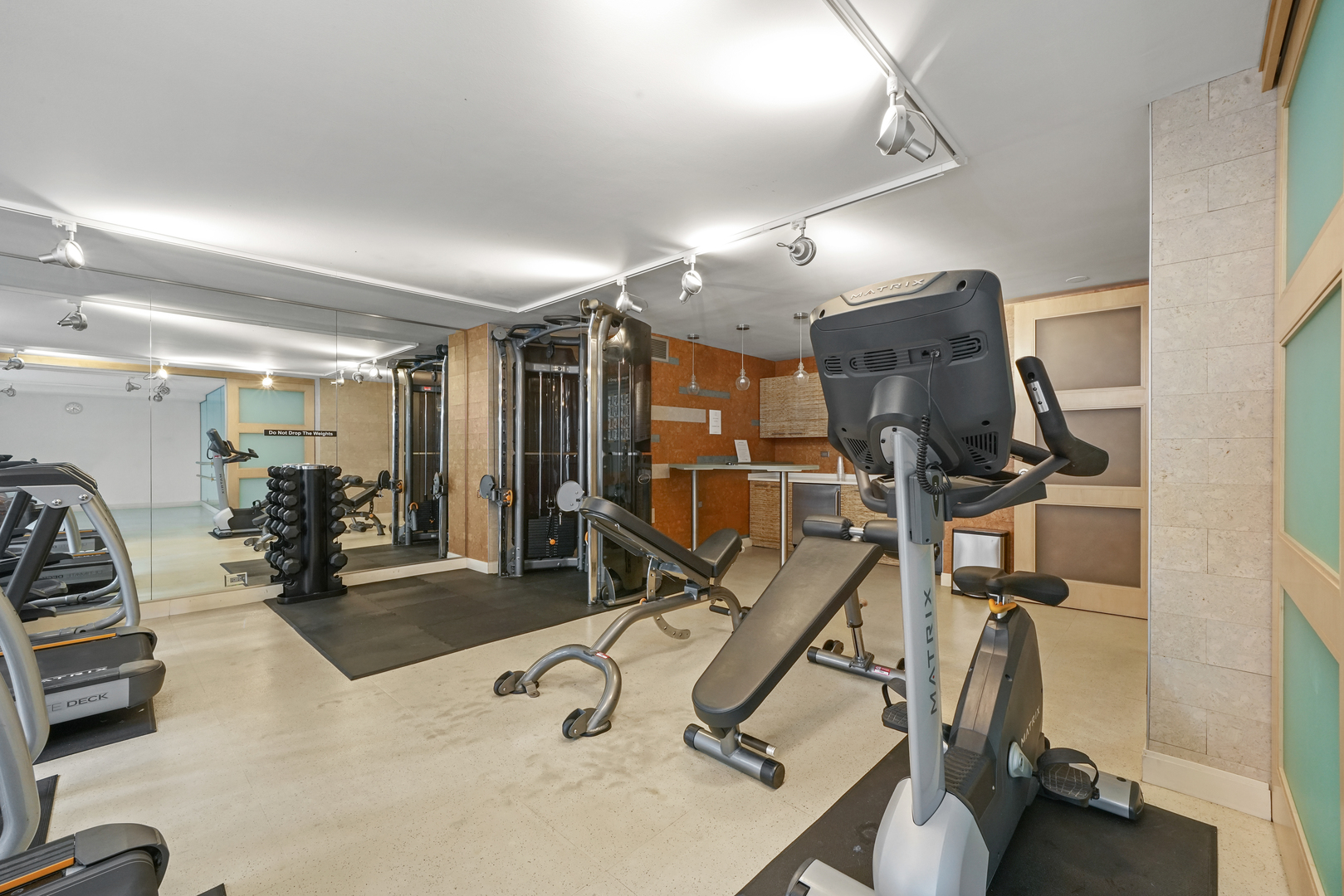 777 North Michigan Avenue, Unit 1601 Chicago, IL 60611 - Photo 36 of 44 a view of a room with gym equipment