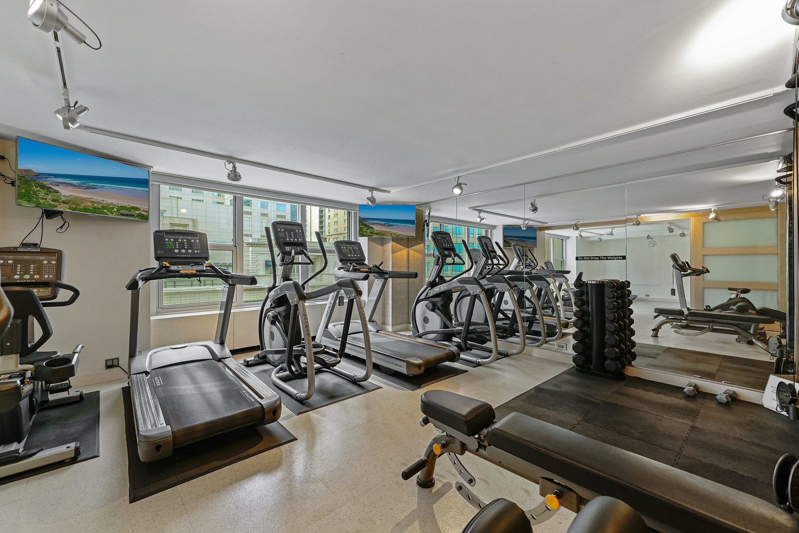 777 North Michigan Avenue, Unit 1601 Chicago, IL 60611 - Photo 39 of 44 a view of a room with gym equipment