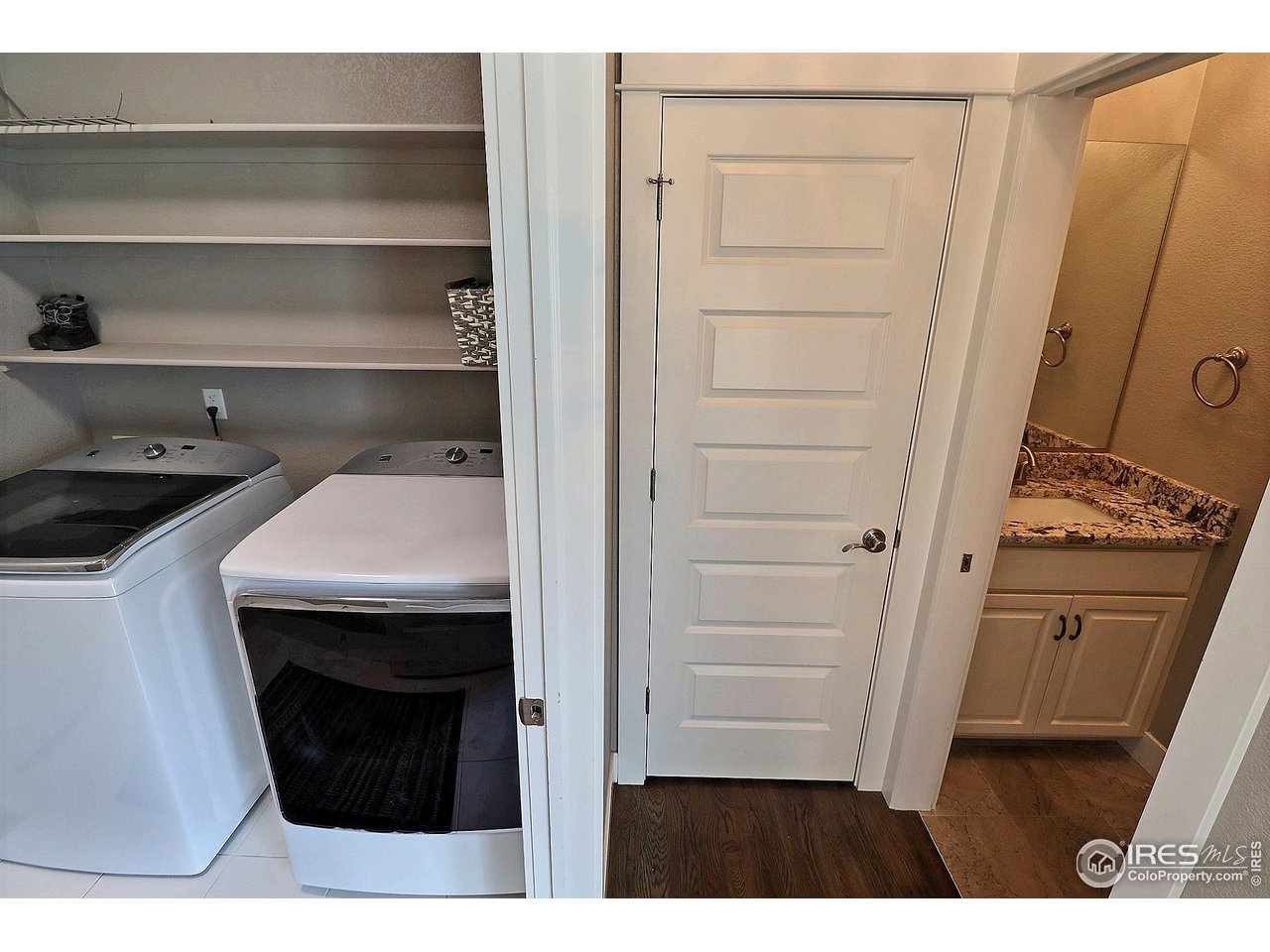 9004 19th Street Greeley, CO 80634 - Photo 22 of 49 a kitchen with a sink and a stove