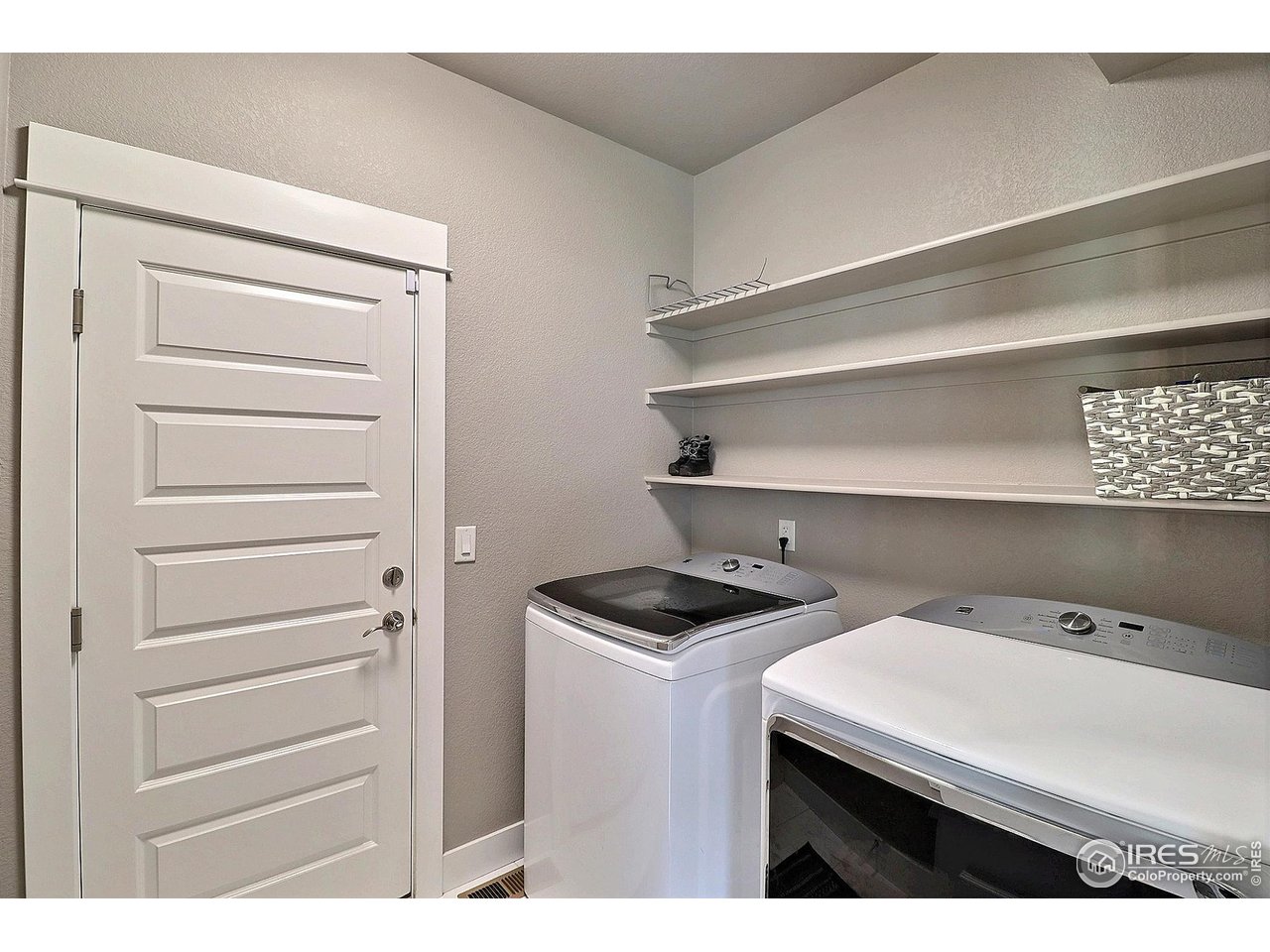 9004 19th Street Greeley, CO 80634 - Photo 23 of 49 a utility room with dryer and washer