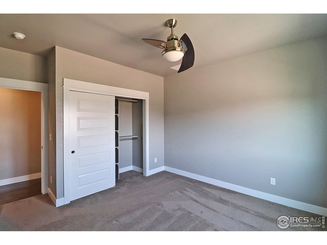 9004 19th Street Greeley, CO 80634 - Photo 33 of 49 a view of a room with wooden floor