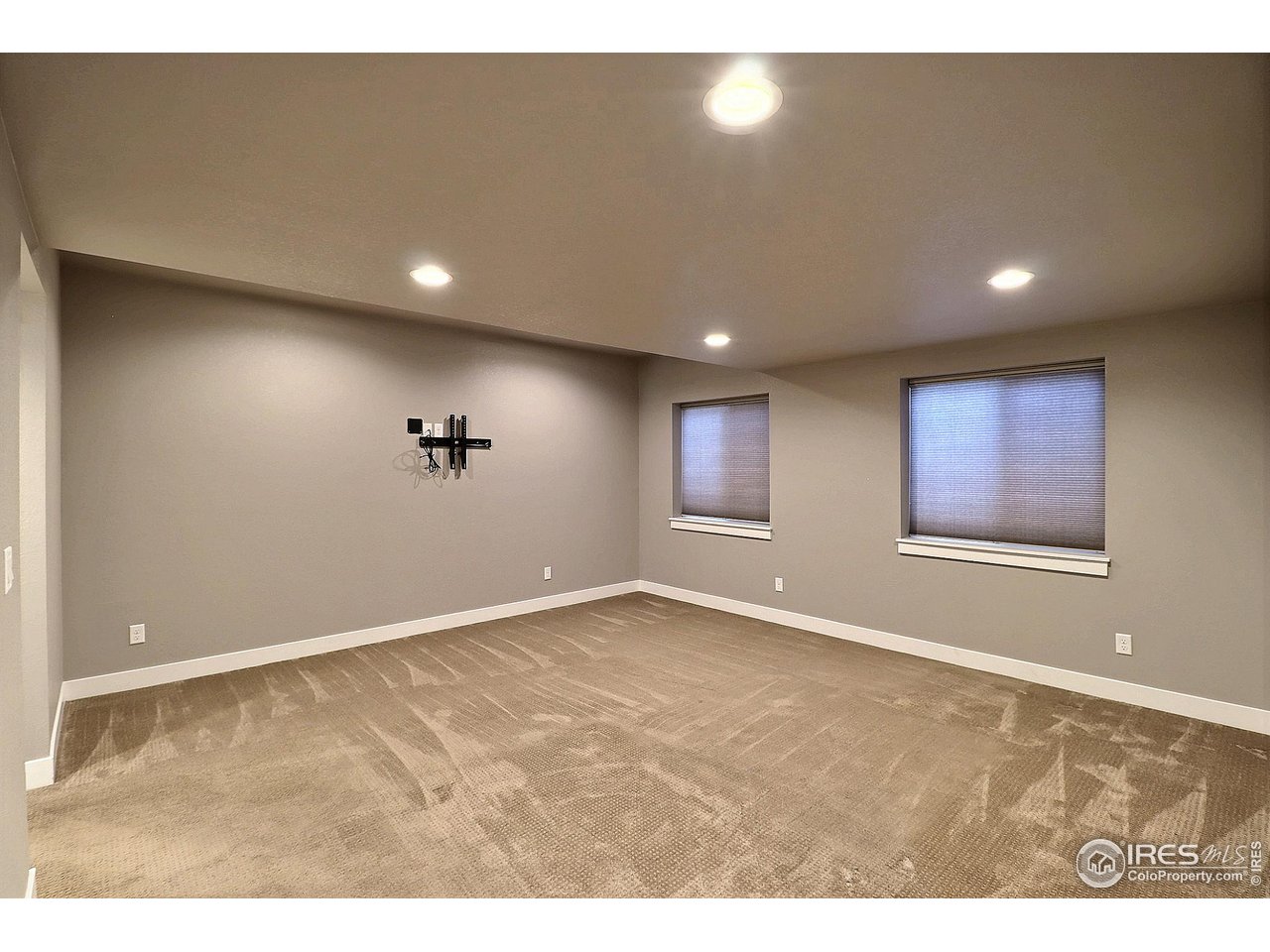 9004 19th Street Greeley, CO 80634 - Photo 39 of 49 a view of an empty room with windows