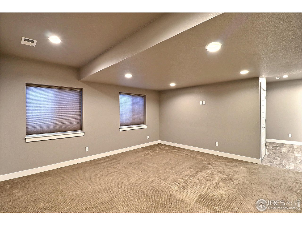 9004 19th Street Greeley, CO 80634 - Photo 40 of 49 an empty room with windows