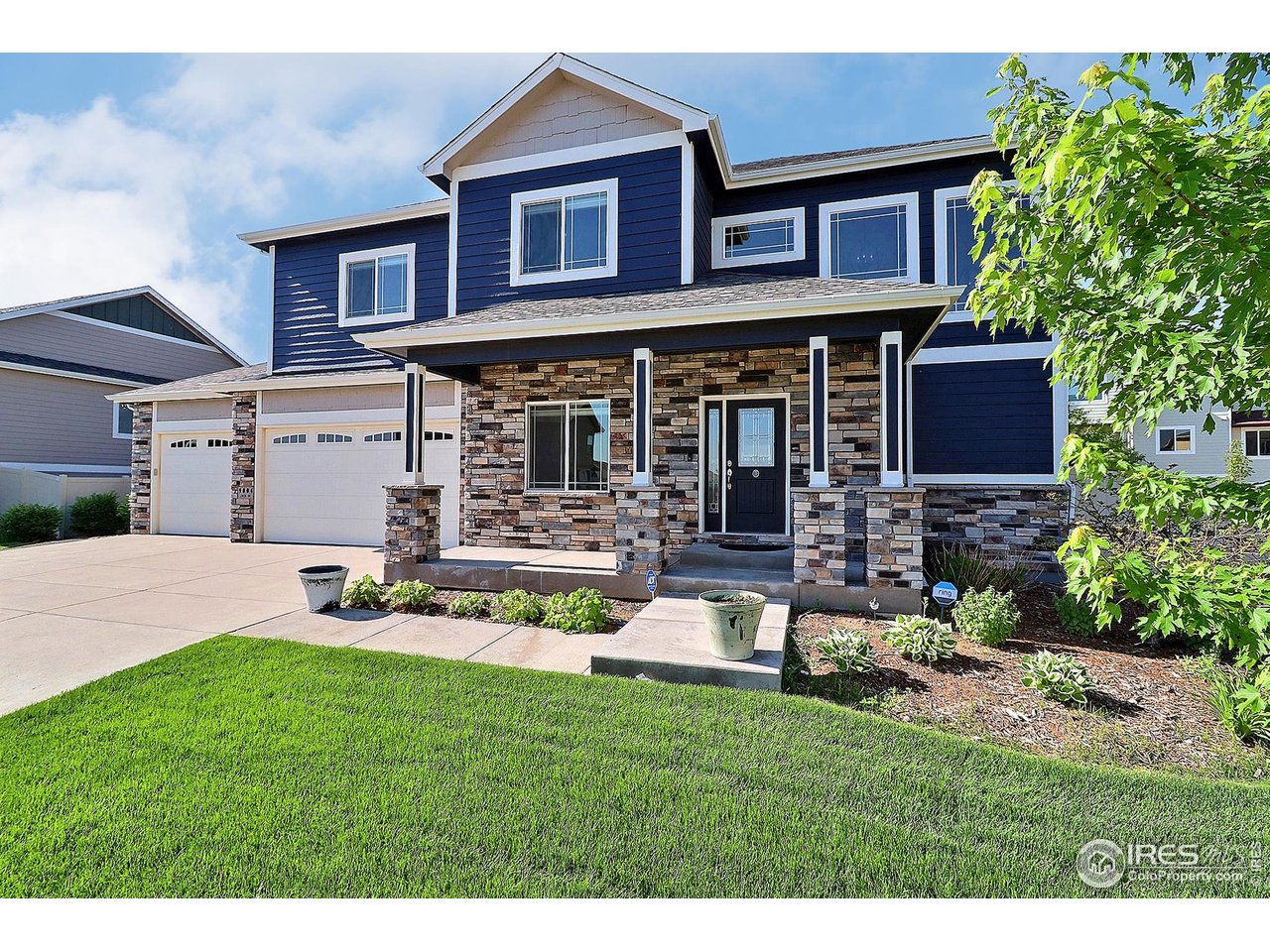 9004 19th Street Greeley, CO 80634 - Photo 48 of 49 a view of a house with a yard porch and sitting area