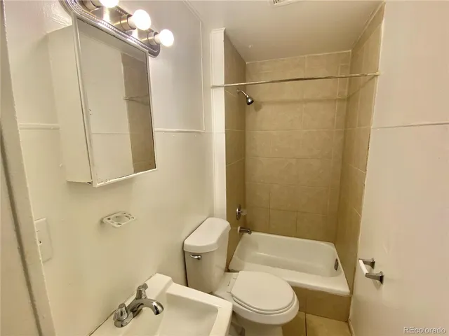 a view of staircase with wooden floor