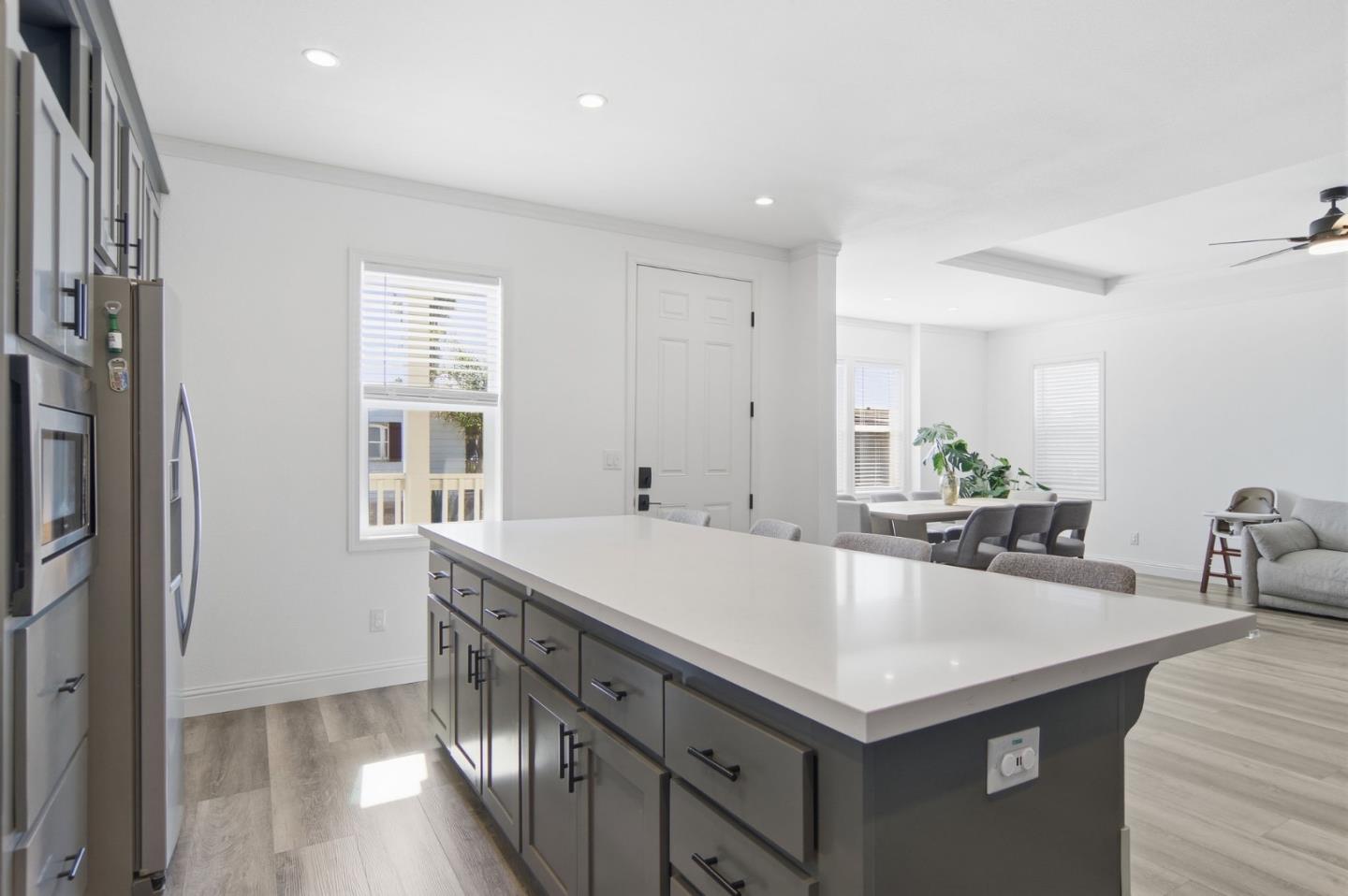 1842 Quimby Road, Unit 1842 San Jose, CA 95122 - Photo 11 of 25 a kitchen with a stove a sink and cabinets