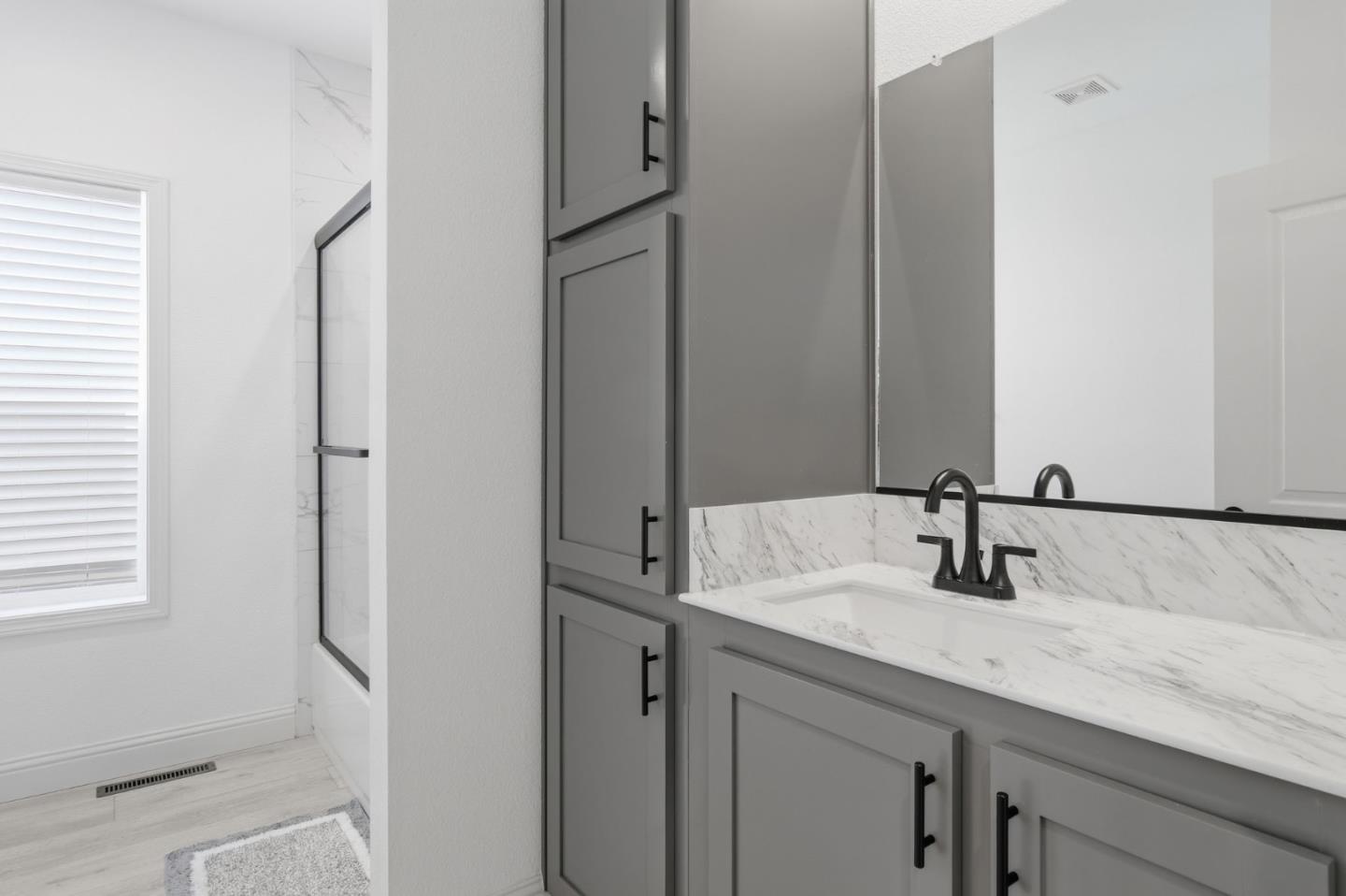 1842 Quimby Road, Unit 1842 San Jose, CA 95122 - Photo 13 of 25 a bathroom with a sink and a mirror