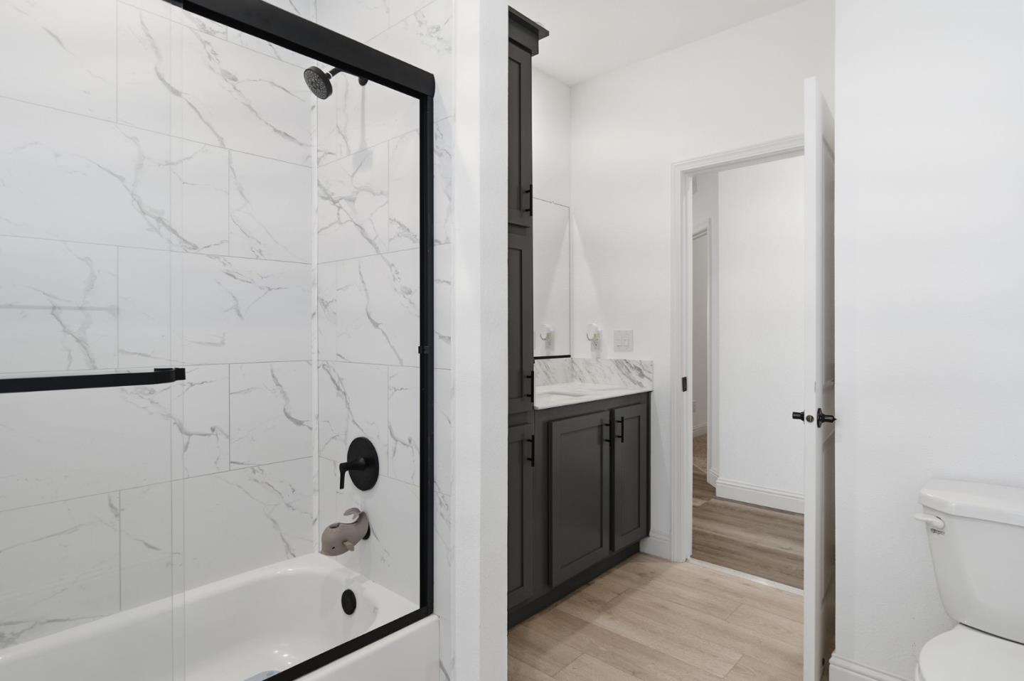 1842 Quimby Road, Unit 1842 San Jose, CA 95122 - Photo 14 of 25 a bathroom with a shower and a toilet