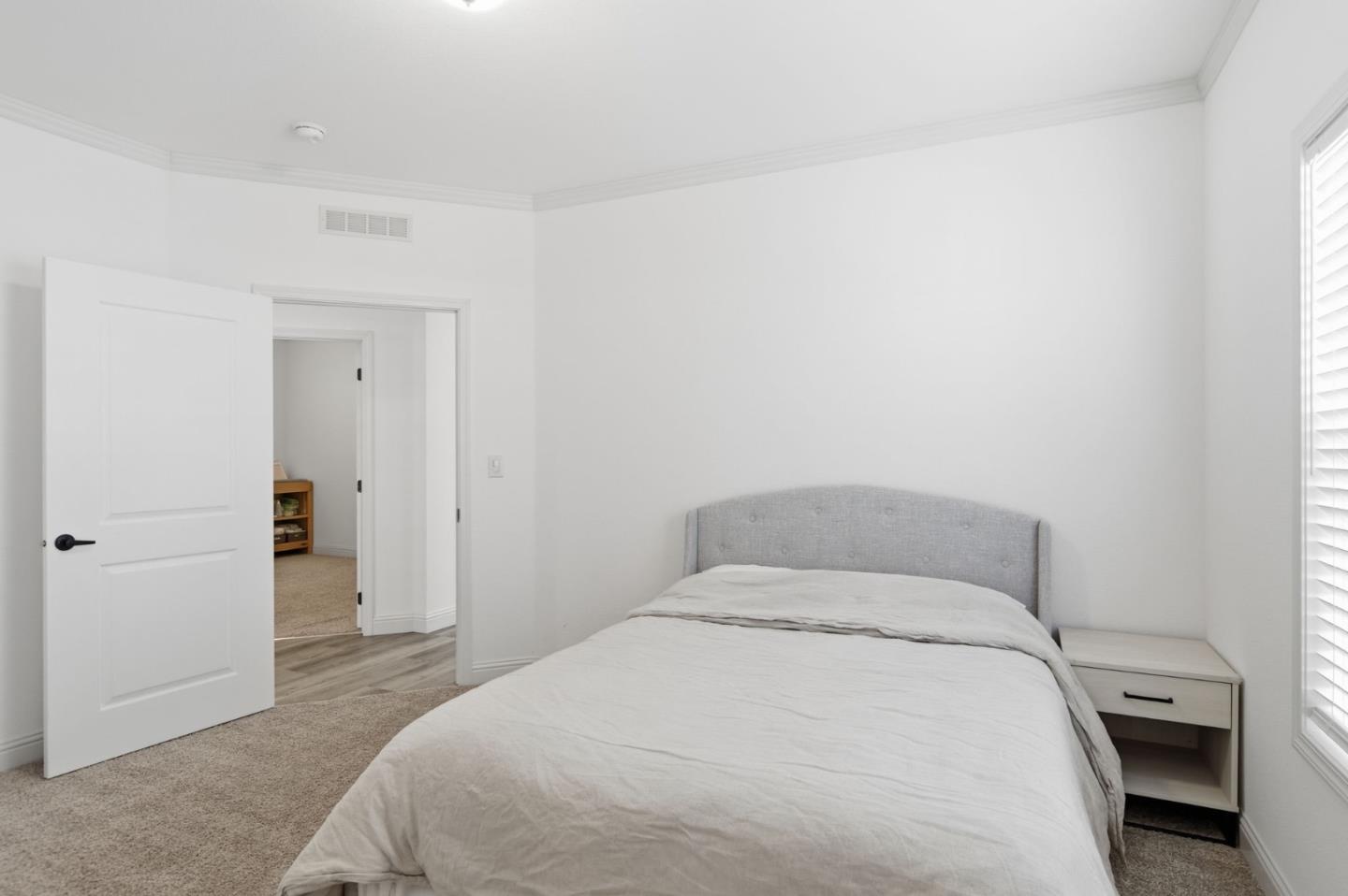 1842 Quimby Road, Unit 1842 San Jose, CA 95122 - Photo 15 of 25 a bedroom with a bed and a closet