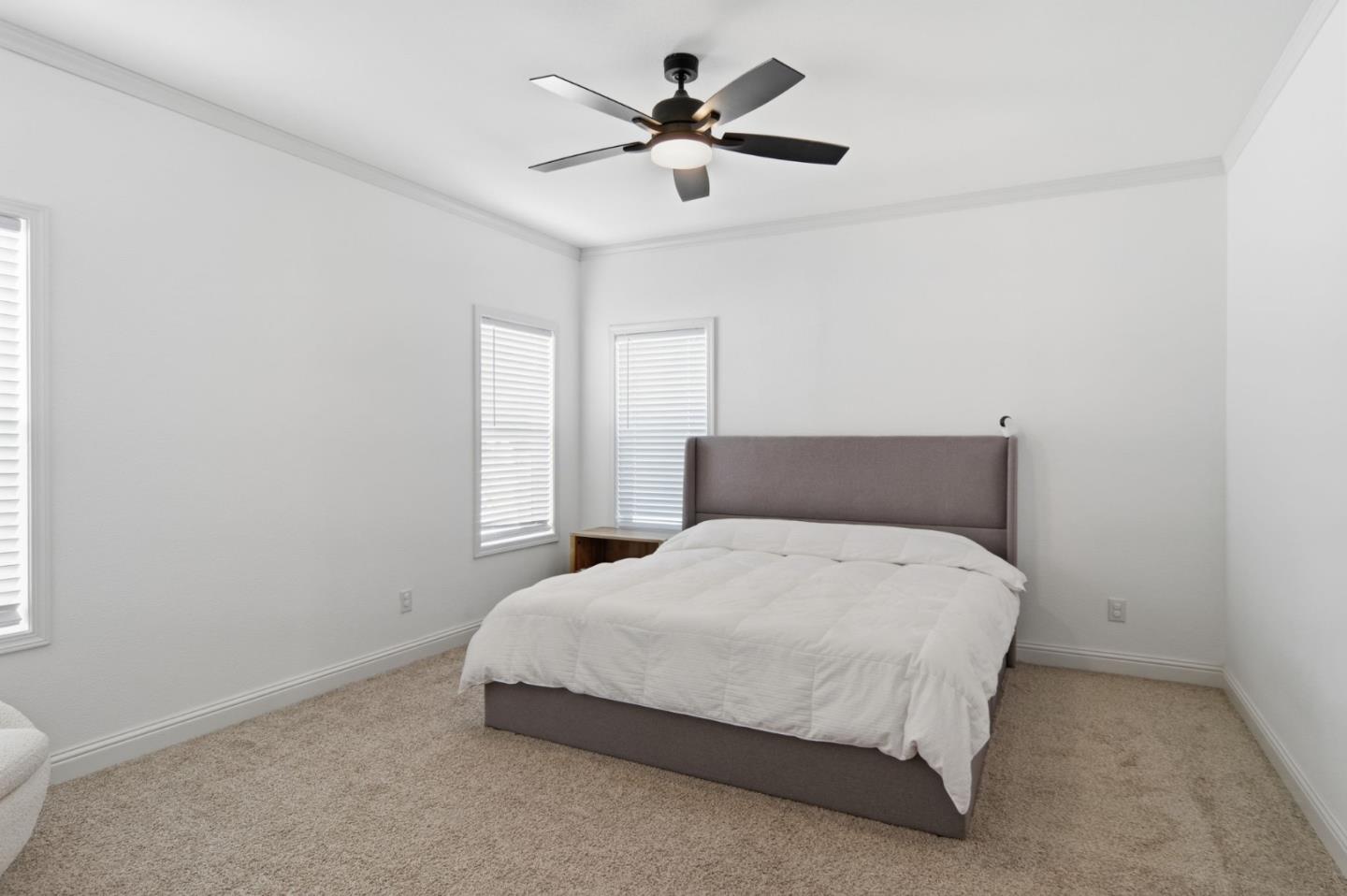 1842 Quimby Road, Unit 1842 San Jose, CA 95122 - Photo 21 of 25 a bedroom with a bed and a ceiling fan
