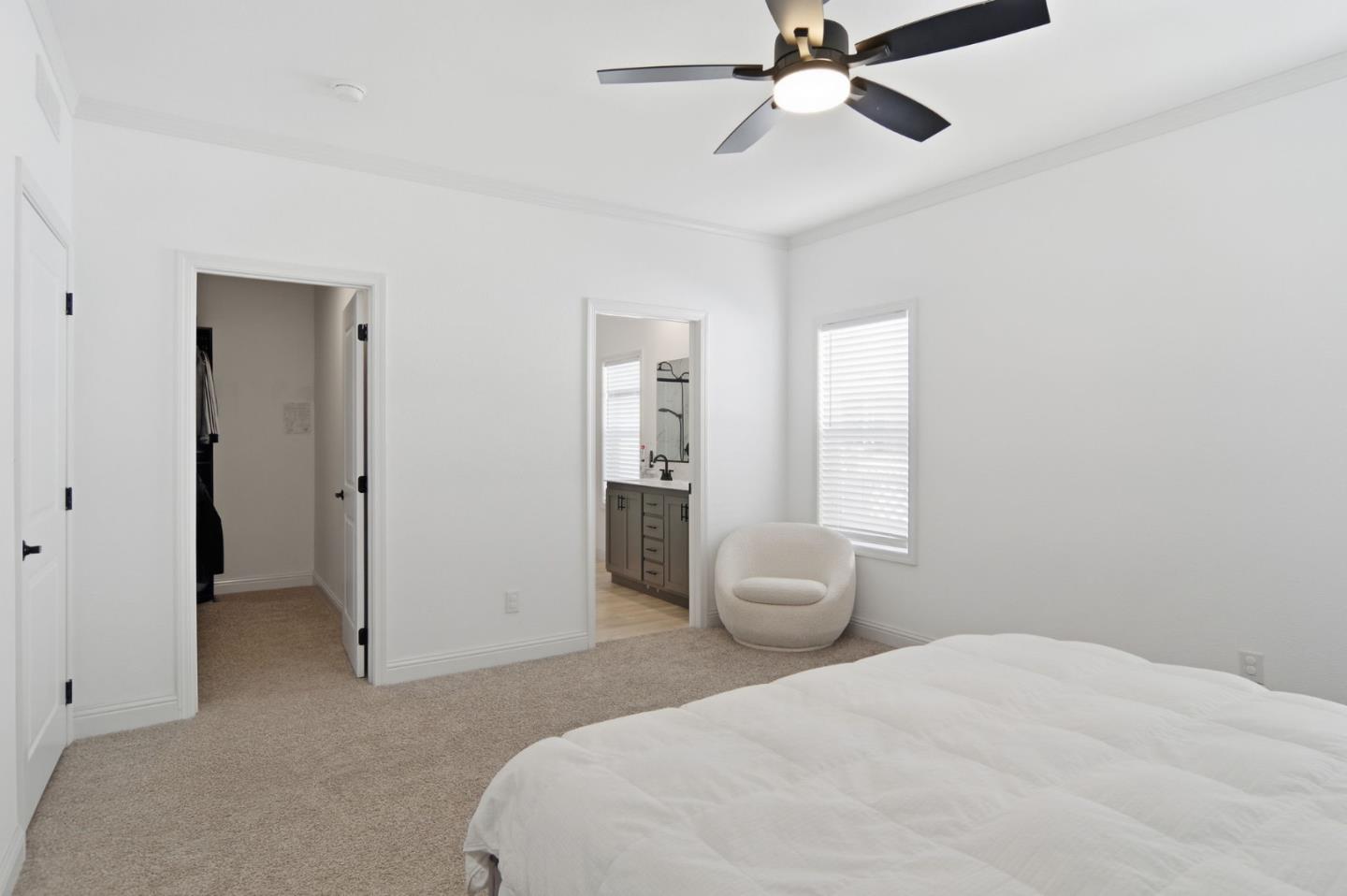 1842 Quimby Road, Unit 1842 San Jose, CA 95122 - Photo 22 of 25 a bedroom with a bed and a chandelier