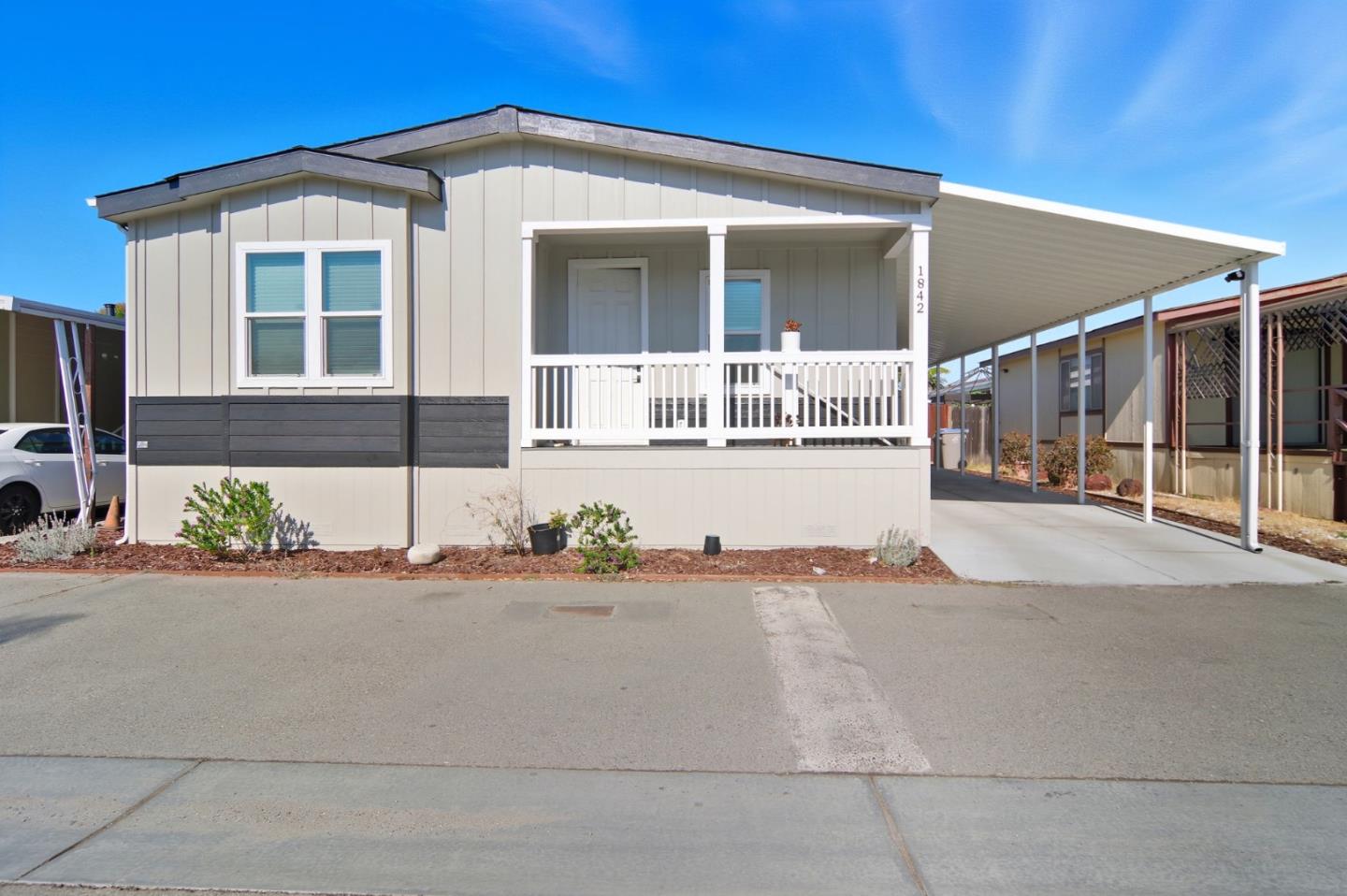 1842 Quimby Road, Unit 1842 San Jose, CA 95122 - Photo 3 of 25 a front view of a house with a garden and yard
