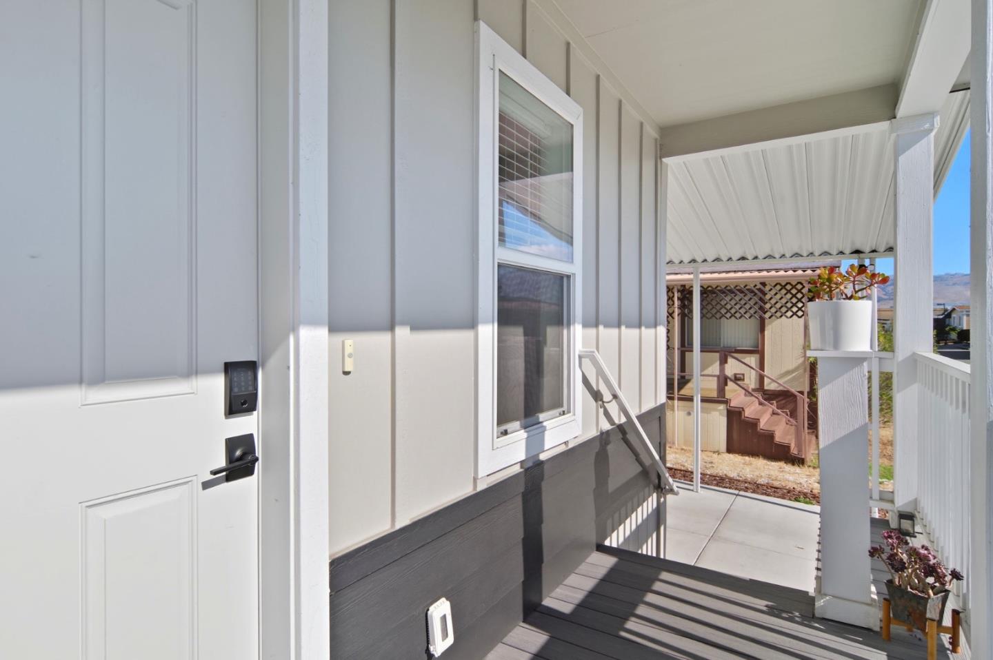 1842 Quimby Road, Unit 1842 San Jose, CA 95122 - Photo 5 of 25 a very nice looking room with a large window and a wooden floor