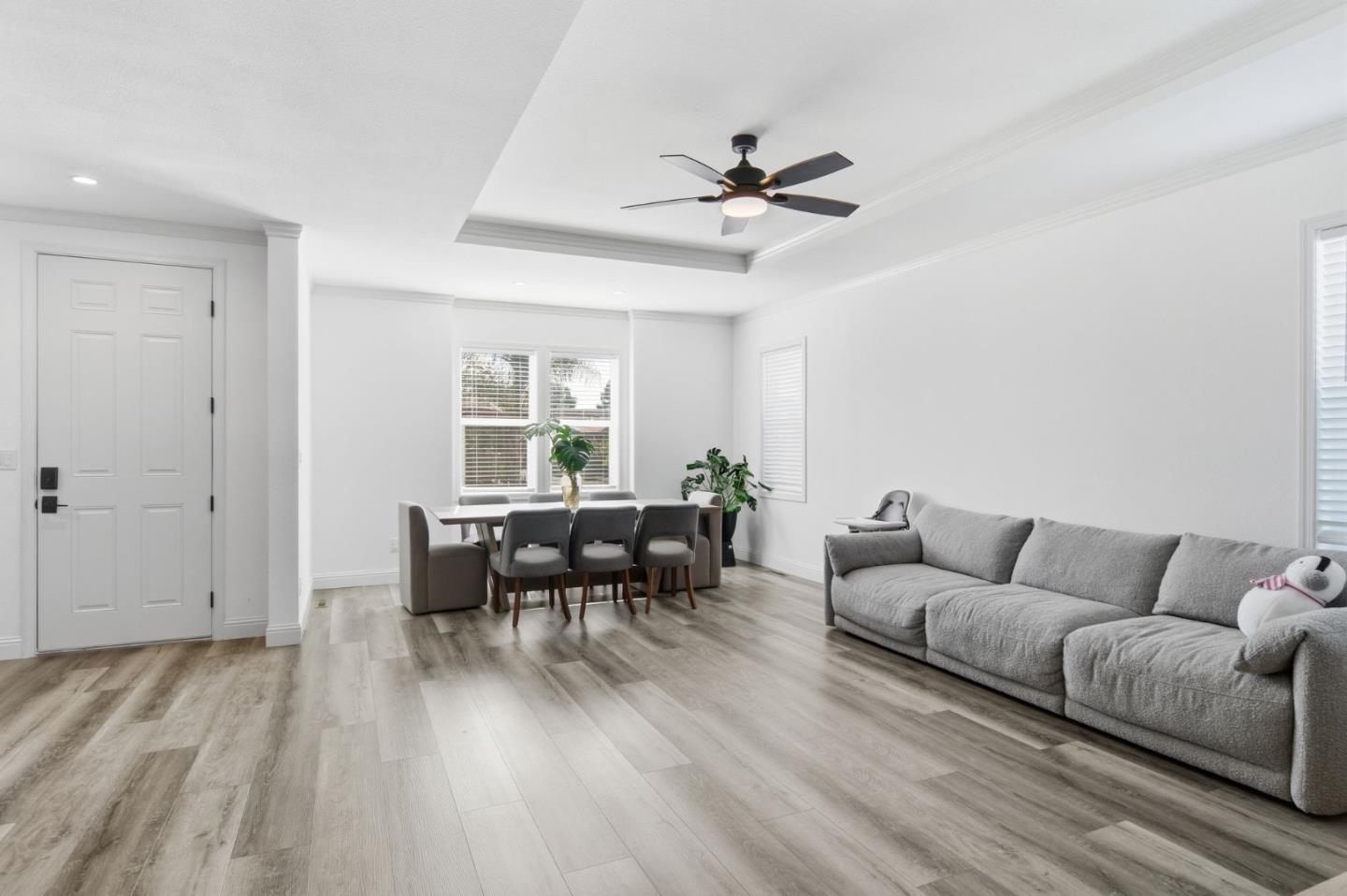 1842 Quimby Road, Unit 1842 San Jose, CA 95122 - Photo 6 of 25 a living room with furniture and a wooden floor