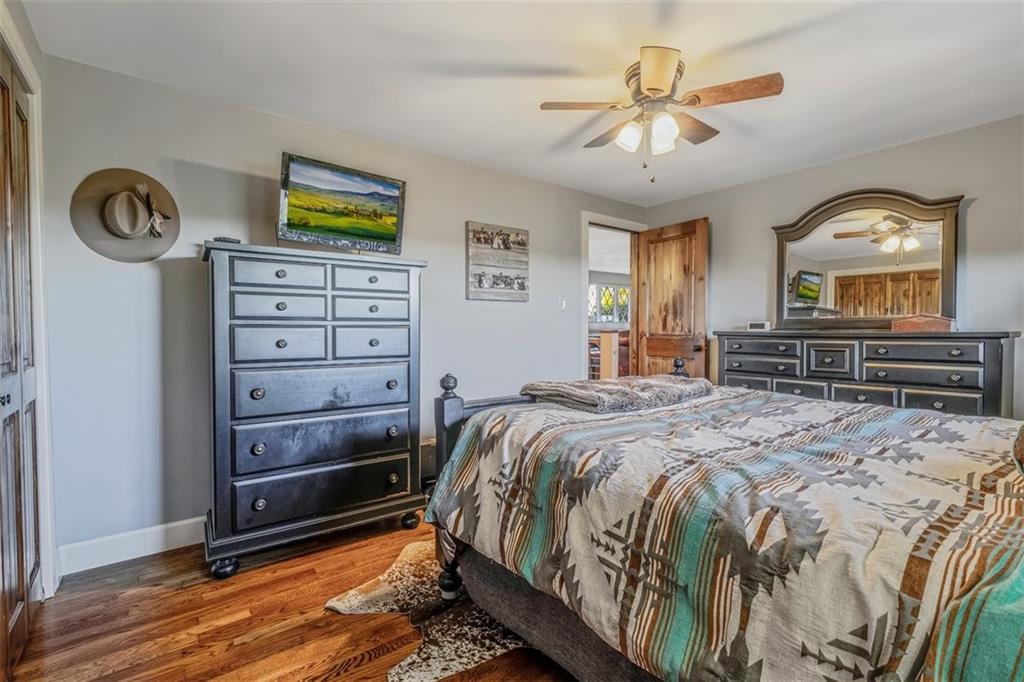 259 Christy Road Eighty Four, PA 15330 - Photo 20 of 46 a bedroom with a bed and a chandelier