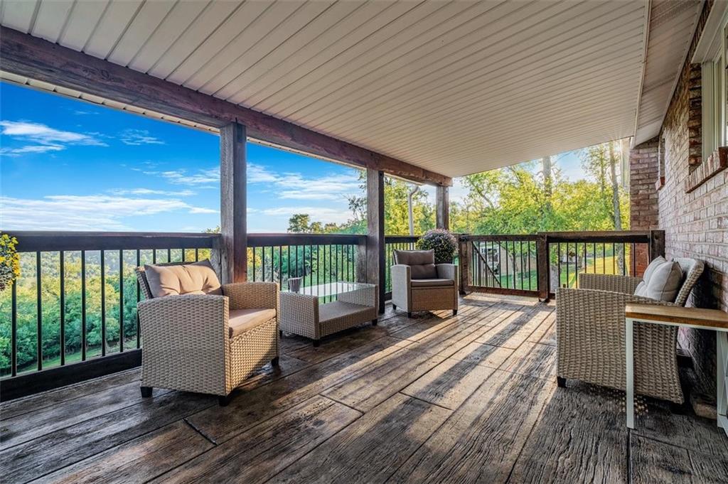 259 Christy Road Eighty Four, PA 15330 - Photo 26 of 46 a living room with furniture fireplace and large windows