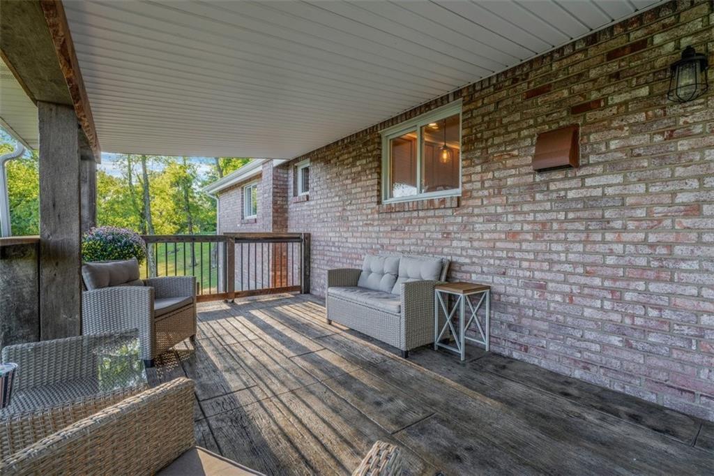 259 Christy Road Eighty Four, PA 15330 - Photo 27 of 46 a balcony with furniture and a wooden floor