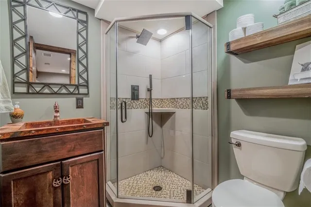 a view of a storage & utility room with a window