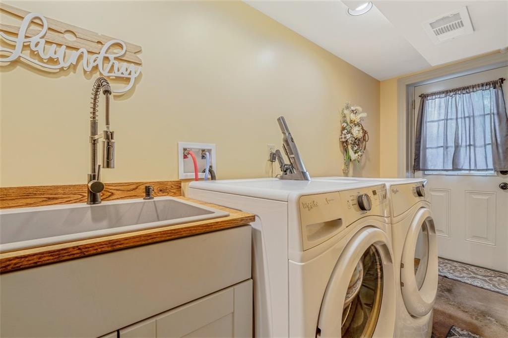 259 Christy Road Eighty Four, PA 15330 - Photo 40 of 46 a utility room with dryer and washer