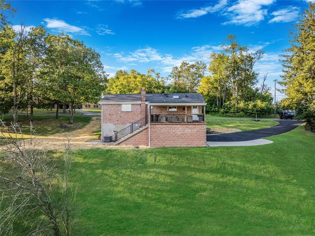 259 Christy Road Eighty Four, PA 15330 - Photo 44 of 46 a view of a house with a yard