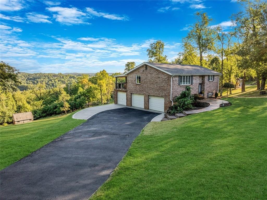259 Christy Road Eighty Four, PA 15330 - Photo 46 of 46 a view of a house with a big yard potted plants and large tree