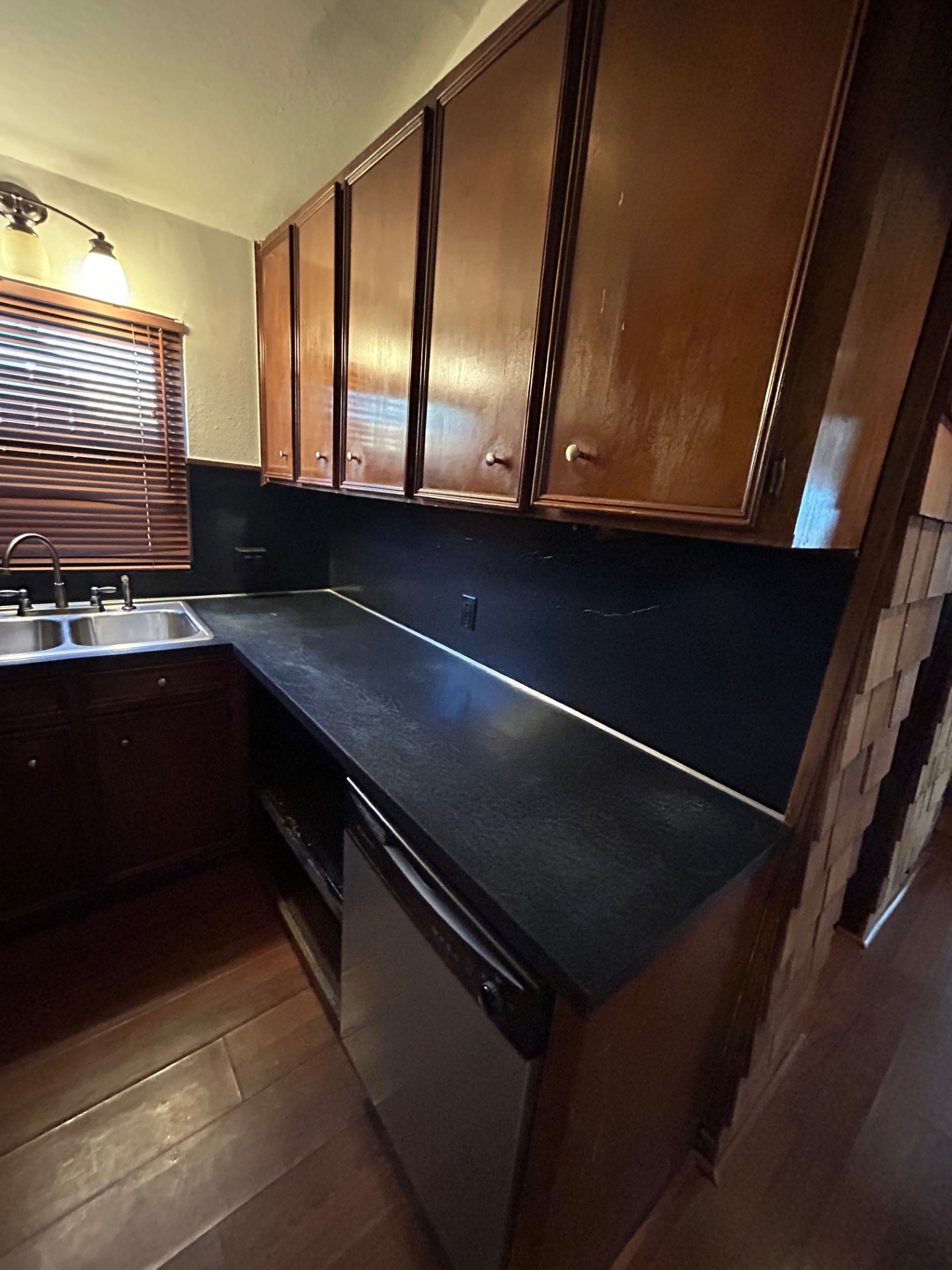 1922 Vassar Street Houston, TX 77098 - Photo 13 of 27 a kitchen with a refrigerator and a sink
