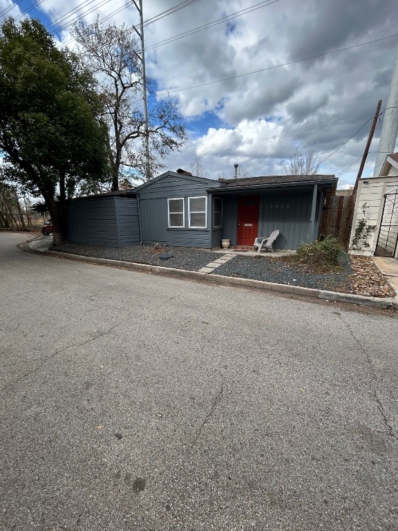 1922 Vassar Street Houston, TX 77098 - Photo 2 of 27 Vassar Street curves around the side of the house and continues, as a one way street, to Hazard Street. There is a circular type of driveway to the left of the house accommodating two cars.